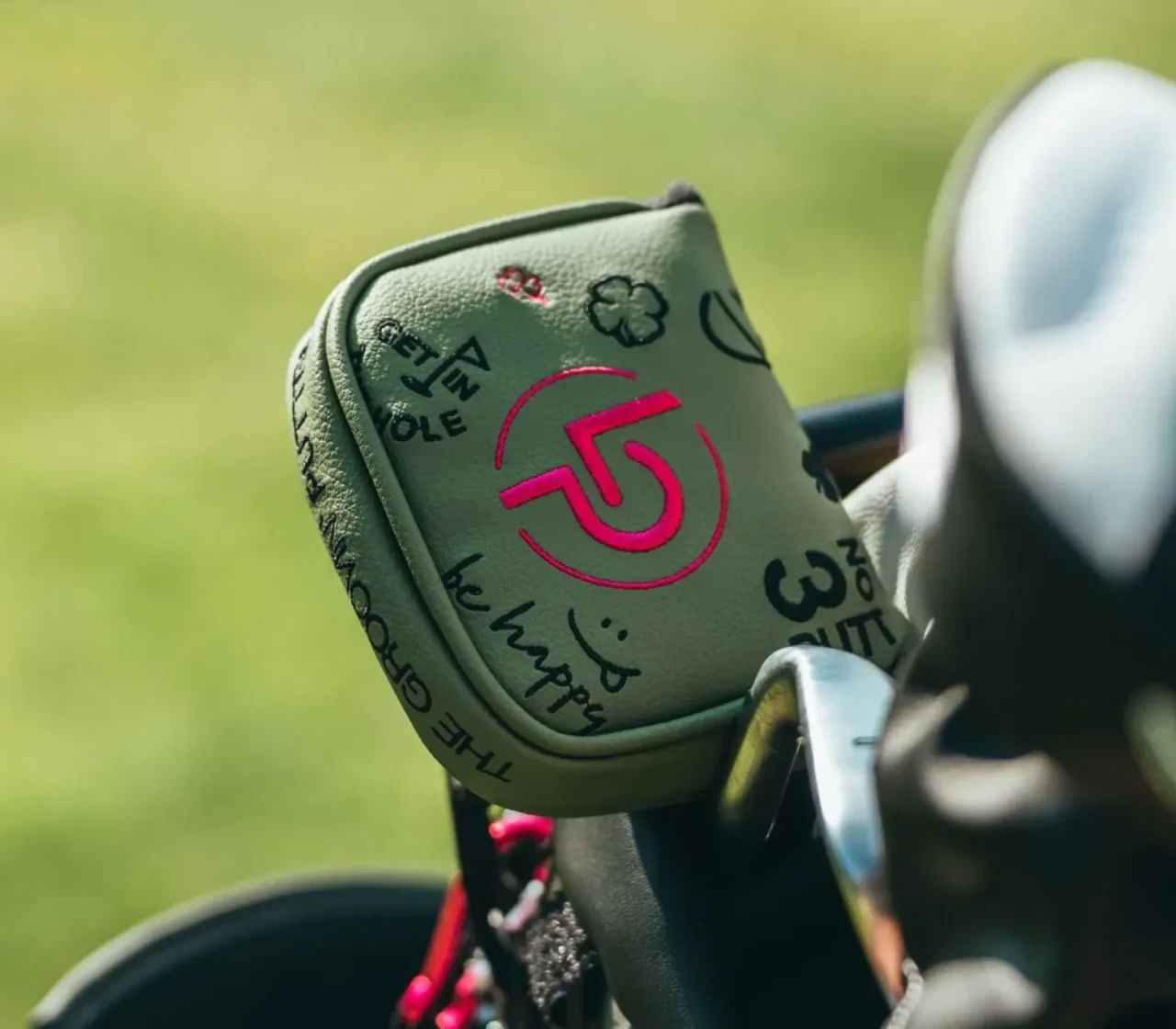 Goldener LP-Putter mit Leder-Headcover