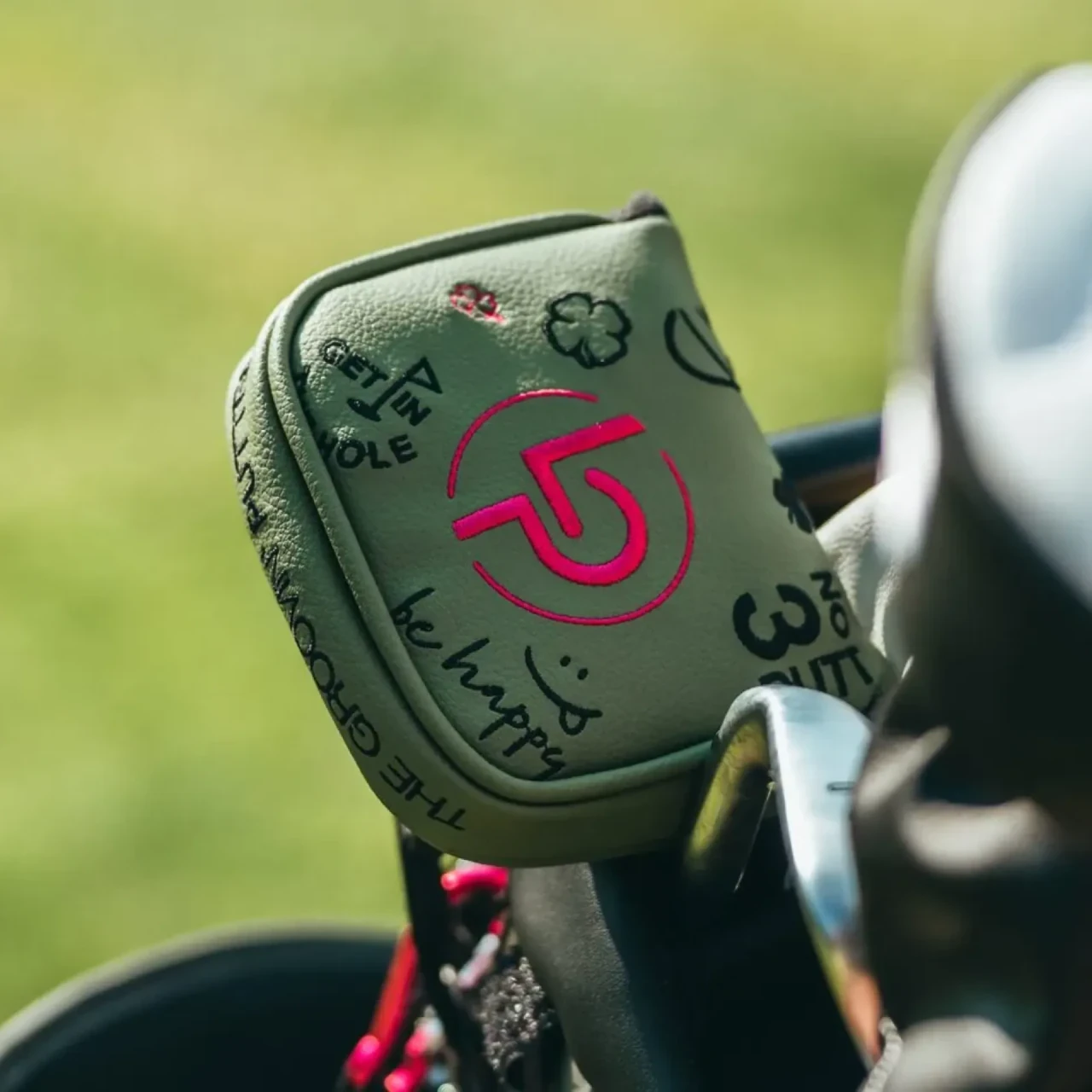 Goldener LP-Putter mit Leder-Headcover